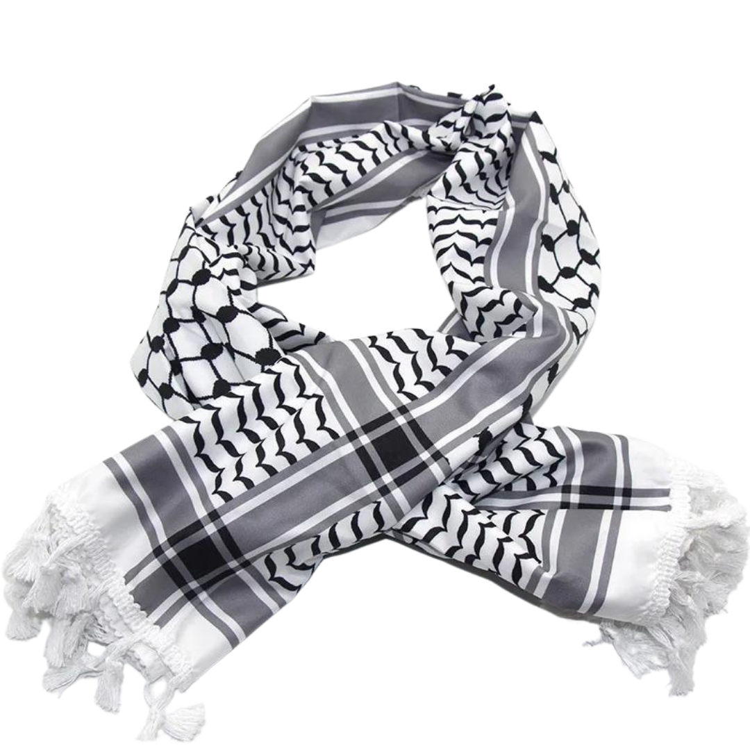 A white keffiyeh (traditional Palestinian headscarf) folded neatly on display. The scarf features a classic pattern of interwoven lines and geometric shapes, symbolizing cultural identity and resistance. The material appears soft and lightweight, perfect for both fashion and practical use. This keffiyeh is part of the "Shadow Resurgence" collection, emphasizing its modern, bold aesthetic while honoring its deep historical roots.